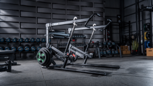 Plate-loaded iso lateral chest press machine with independent arms in a commercial gym