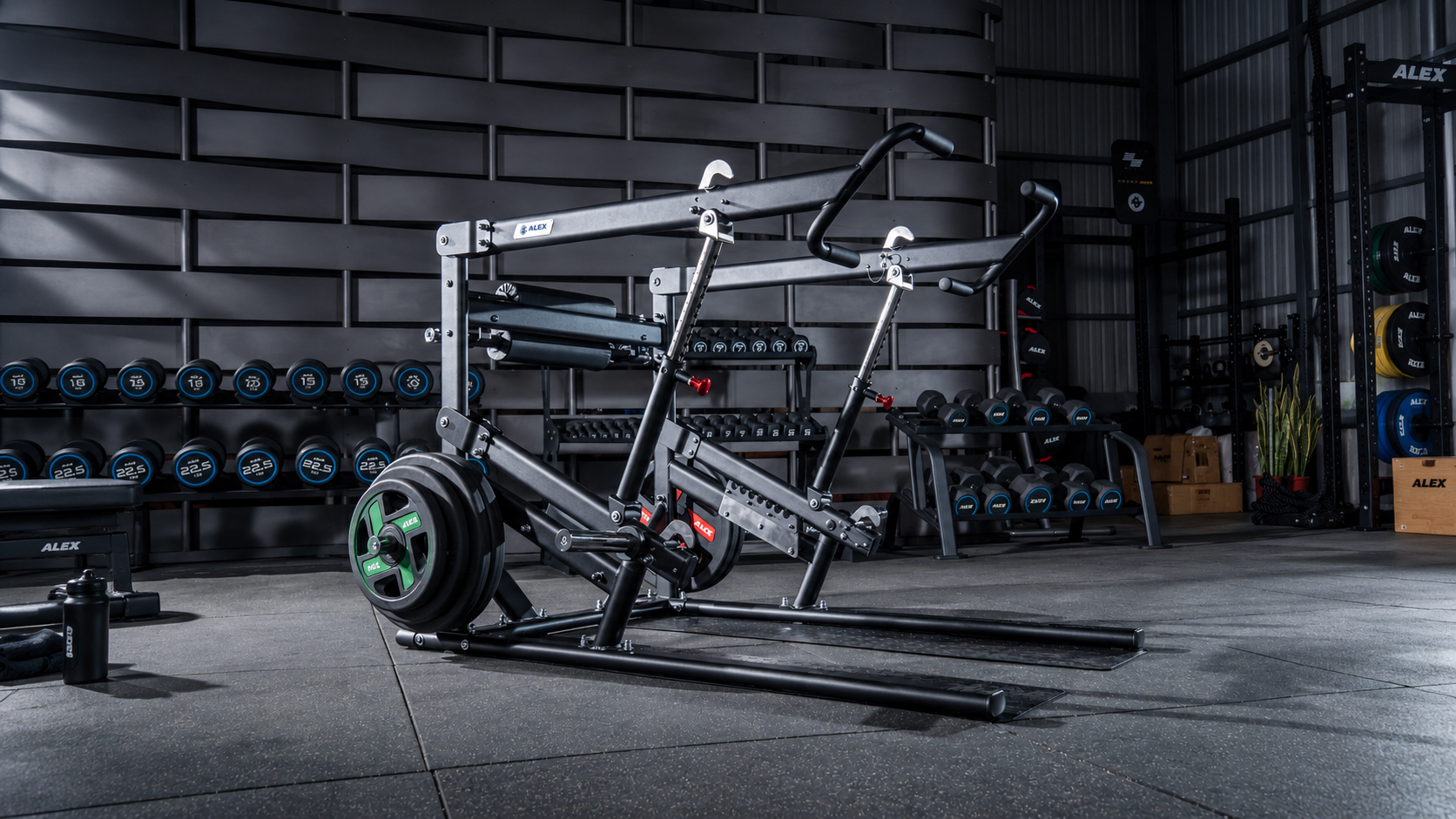 Plate-loaded iso lateral chest press machine with independent arms in a commercial gym